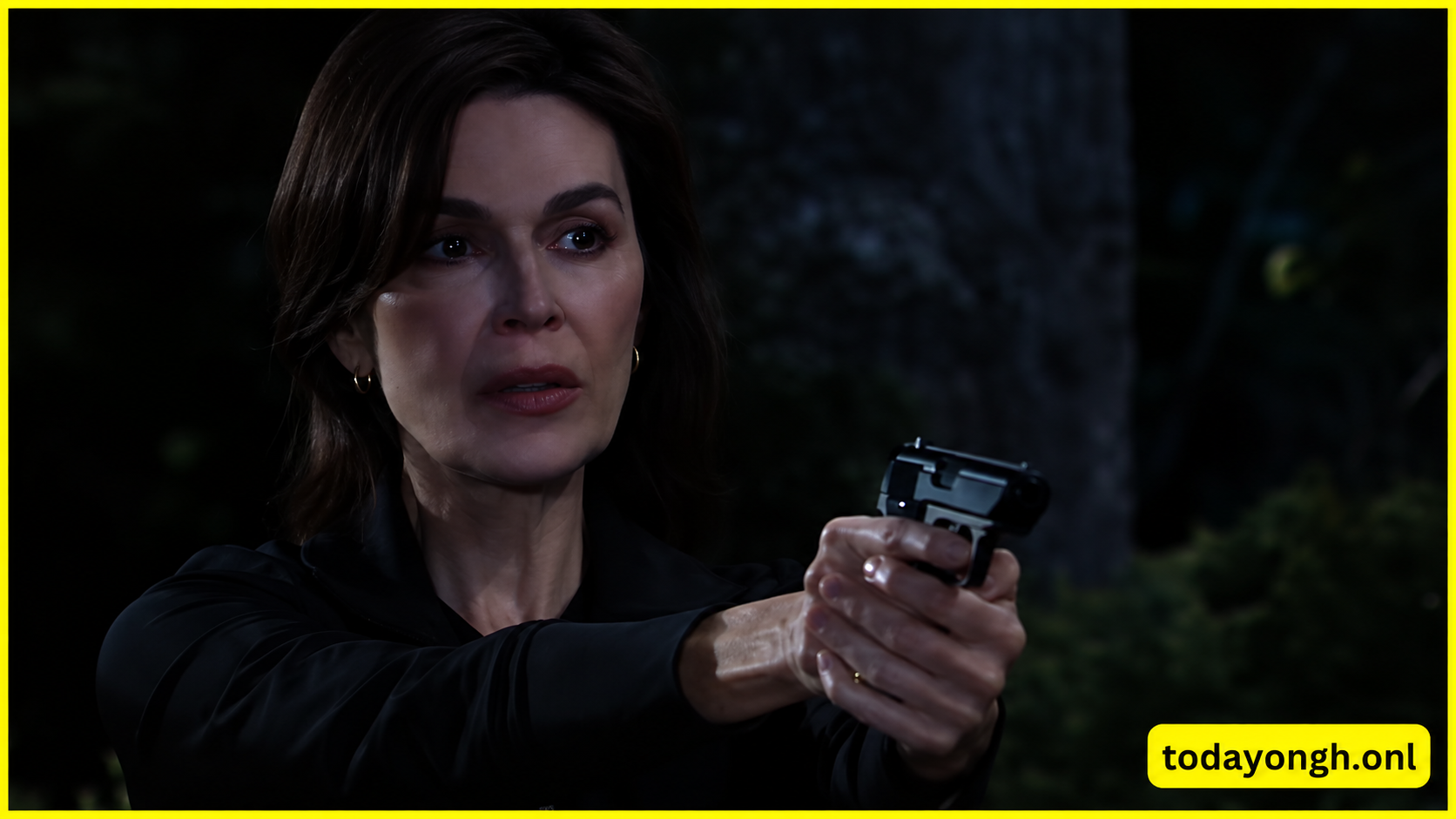 Anna Devane holds Britt at gunpoint as Jason races to intervene.